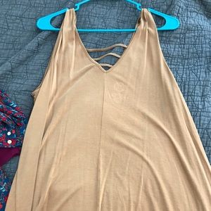 Maurice’s mustard colored tank